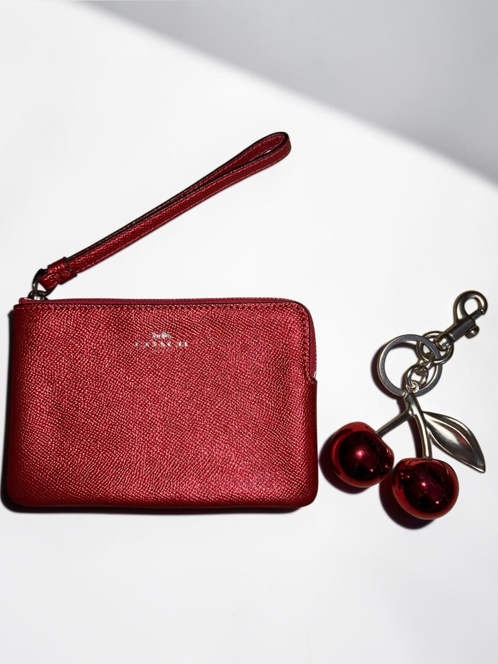 Coach Metallic Red Leather Wristlet with unbranded Cherry Charm